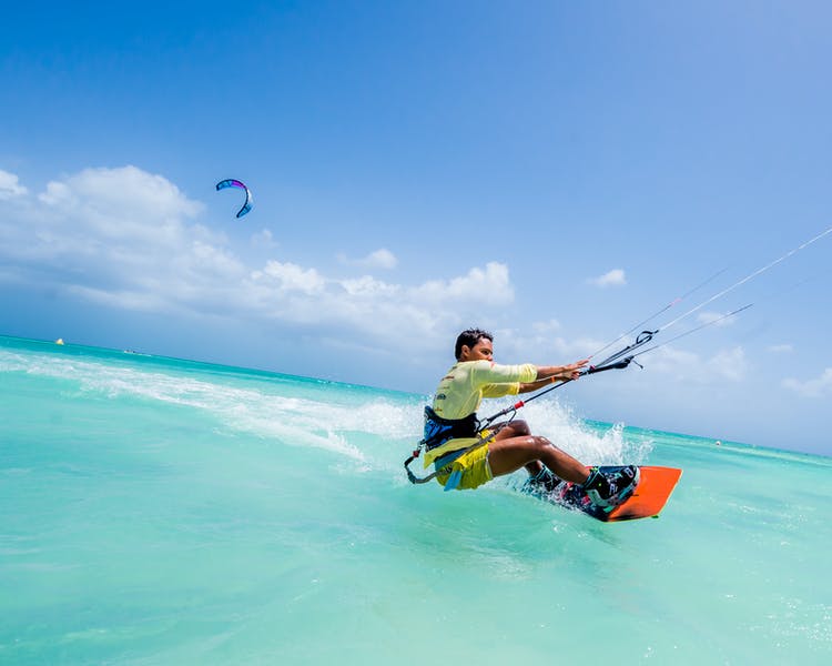 Man parasurfing in ocean